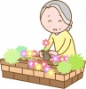 花壇の手入れをするおばあちゃん