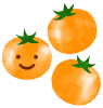 笑顔のオレンジ色のトマト