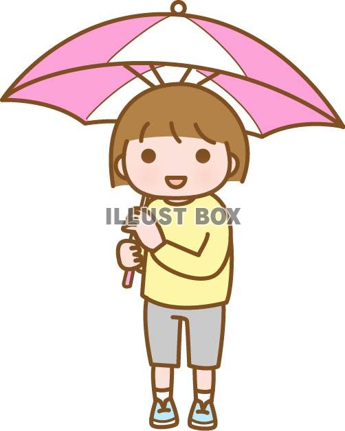 ピンク色の傘を差したかわいい女の子